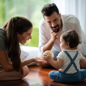 young mother and child baby are happy at home, childhood family concept with caucasian mom and little boy, newborn care lifestyle