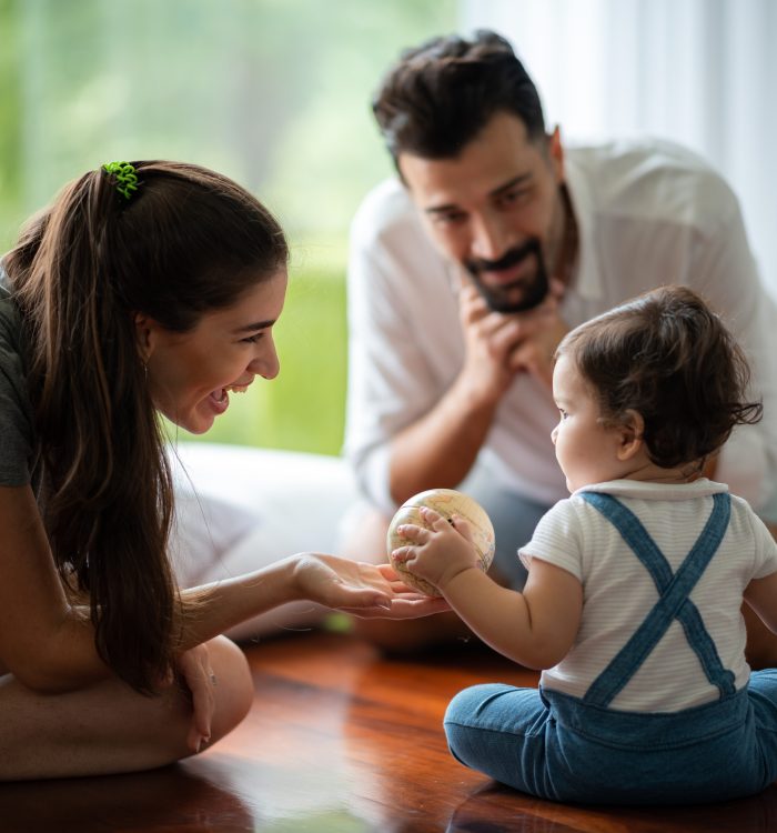 young mother and child baby are happy at home, childhood family concept with caucasian mom and little boy, newborn care lifestyle