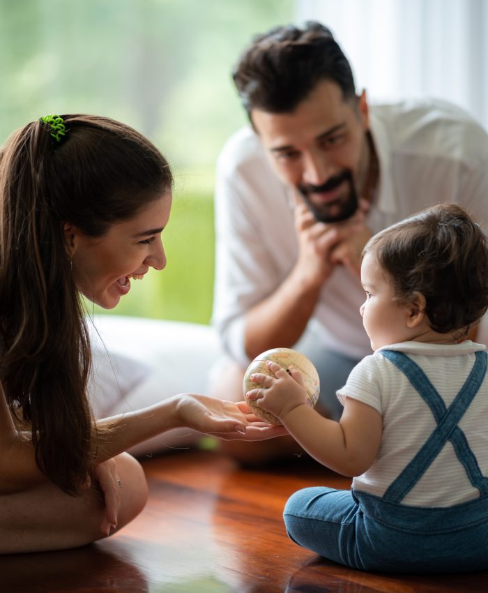 young mother and child baby are happy at home, childhood family concept with caucasian mom and little boy, newborn care lifestyle